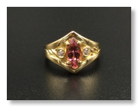 Custom gold ring by Robilotti